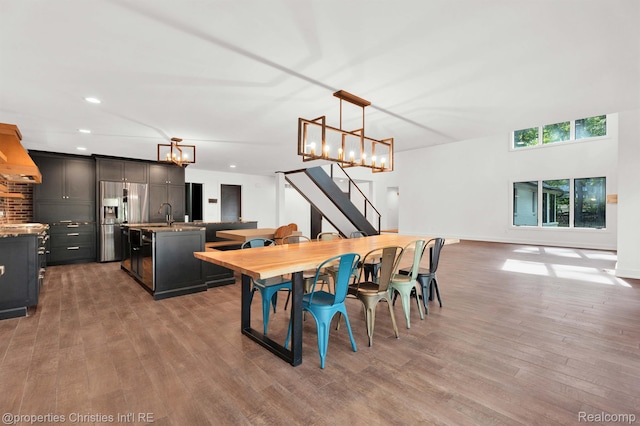 5080 Tootmoor Rd, Bloomfield Hills, MI 48302 - dining space with stairway, wood finished floors, a chandelier, and recessed lighting