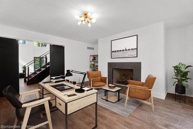 5080 Tootmoor Rd, Bloomfield Hills, MI 48302 - office with wood finished floors, a tile fireplace, baseboards, and a chandelier