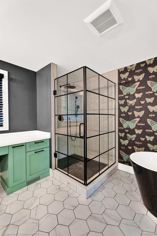 5080 Tootmoor Rd, Bloomfield Hills, MI 48302 - bathroom featuring a freestanding bath, a stall shower, and vanity