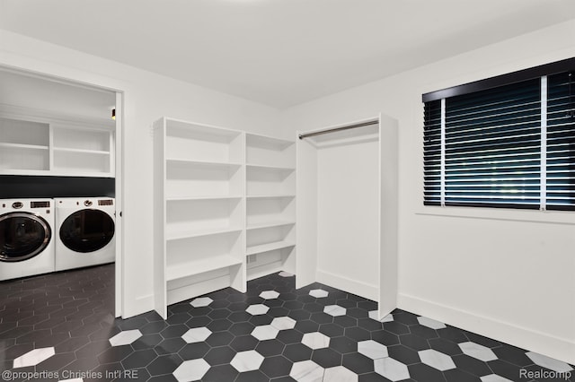 5080 Tootmoor Rd, Bloomfield Hills, MI 48302 - washroom with washing machine and dryer and dark tile patterned flooring