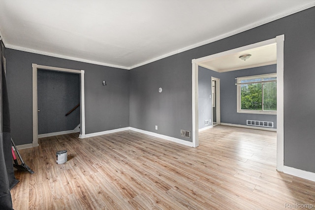 15817 Cheyenne St, Detroit, MI 48227 - unfurnished room with crown molding, light wood-type flooring, and baseboards