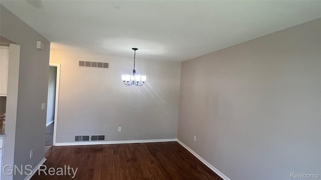 604 Millard Ave, Royal Oak, MI 48073 - unfurnished dining area with wood finished floors, baseboards, and a chandelier