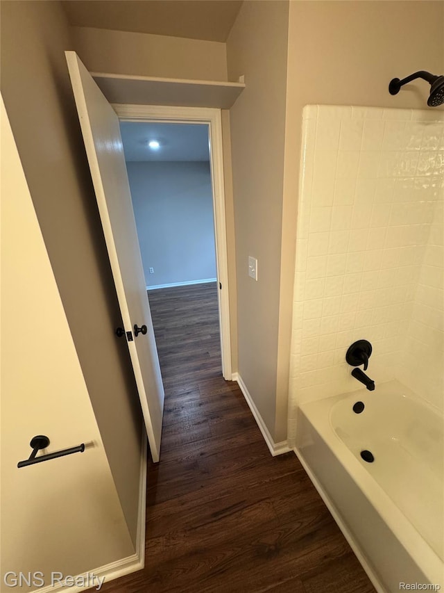 604 Millard Ave, Royal Oak, MI 48073 - bathroom with wood finished floors, baseboards, and bathing tub / shower combination