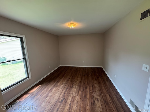 604 Millard Ave, Royal Oak, MI 48073 - unfurnished room with dark wood-style floors and baseboards