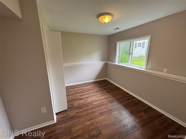 604 Millard Ave, Royal Oak, MI 48073 - unfurnished room with dark wood-style floors and baseboards