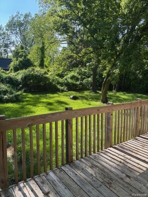 3231 Parker St, Port Huron, MI 48060 - wooden deck featuring a lawn