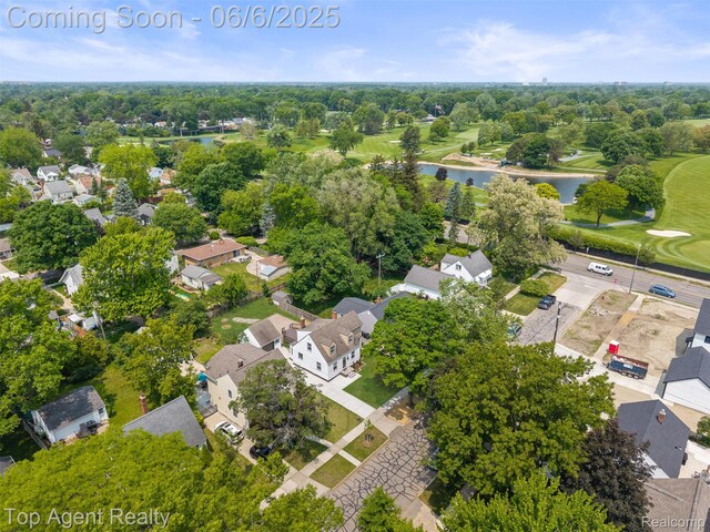 1703 N Blair Ave, Royal Oak, MI 48067 - aerial perspective of suburban area with a large body of water, a tree filled landscape, and a golf course