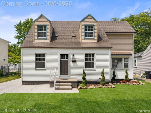 1703 N Blair Ave, Royal Oak, MI 48067 - cape cod home featuring roof with shingles and a patio area