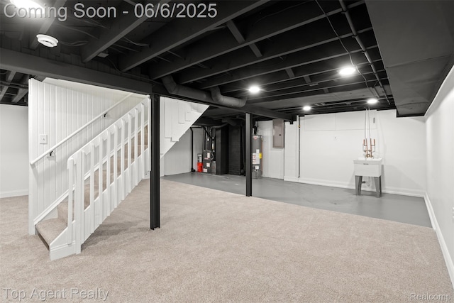 1703 N Blair Ave, Royal Oak, MI 48067 - finished basement featuring gas water heater, baseboards, and carpet floors
