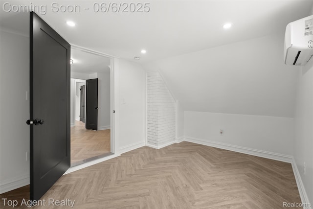 1703 N Blair Ave, Royal Oak, MI 48067 - additional living space with baseboards, an AC wall unit, and recessed lighting