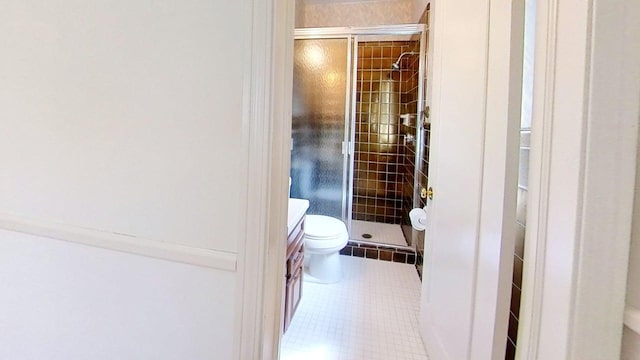1635 Woodside Dr, East Lansing, MI 48823 - full bath featuring a shower stall, tile patterned floors, toilet, and vanity