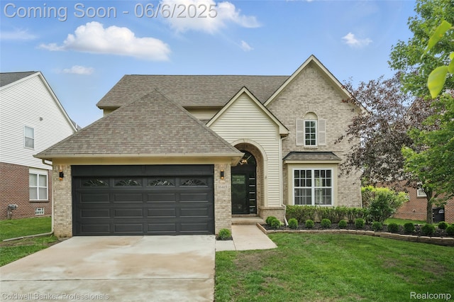 16413 Mulberry Way, Northville, MI 48168 - traditional home with brick siding, roof with shingles, an attached garage, and a front lawn