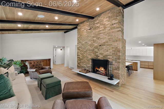 4340 Charing Cross Rd, Bloomfield Hills, MI 48304 - living area with light wood-type flooring, high vaulted ceiling, a fireplace, recessed lighting, and wooden ceiling with exposed beams