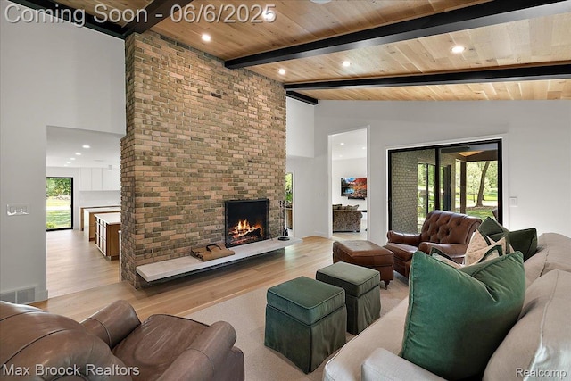 4340 Charing Cross Rd, Bloomfield Hills, MI 48304 - living area featuring high vaulted ceiling, wood finished floors, a brick fireplace, wooden ceiling with exposed beams, and recessed lighting