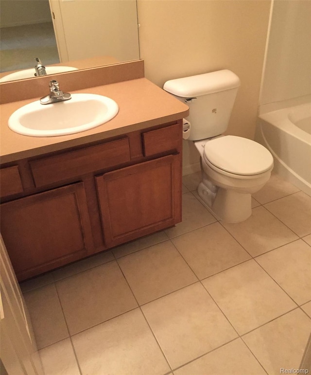 49225 W Woods Dr Unit 20, Utica, MI 48317 - full bathroom with vanity, toilet, and tile patterned flooring