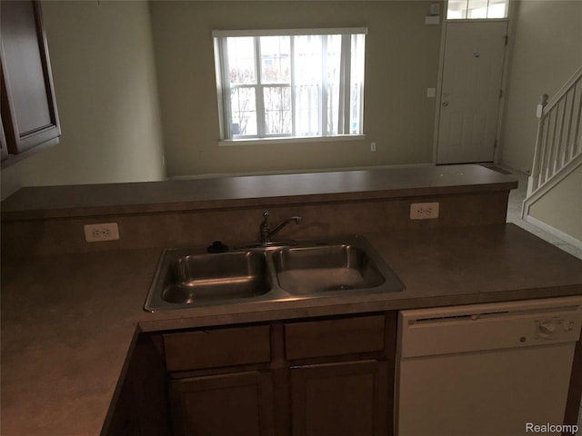 49225 W Woods Dr Unit 20, Utica, MI 48317 - kitchen featuring dishwasher, a sink, and healthy amount of natural light