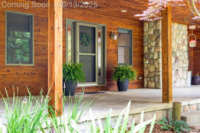 4230 Mill Lake Rd, Lake Orion, MI 48360 - entrance to property with covered porch and stone siding
