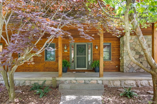 4230 Mill Lake Rd, Lake Orion, MI 48360 - property entrance featuring covered porch