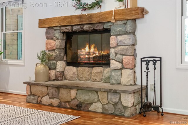 4230 Mill Lake Rd, Lake Orion, MI 48360 - detailed view of wood finished floors and a fireplace
