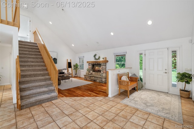 4230 Mill Lake Rd, Lake Orion, MI 48360 - foyer with stairway, high vaulted ceiling, recessed lighting, and a fireplace