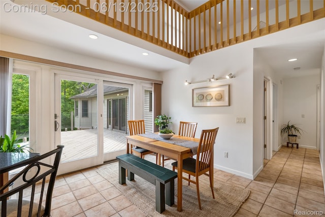 4230 Mill Lake Rd, Lake Orion, MI 48360 - dining area featuring light tile patterned floors and a high ceiling