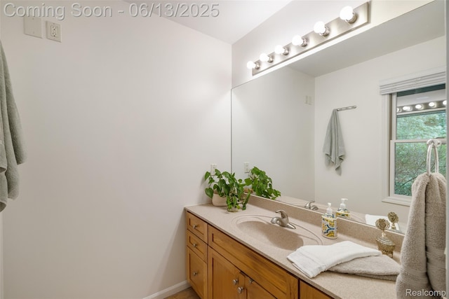 4230 Mill Lake Rd, Lake Orion, MI 48360 - bathroom featuring vanity and baseboards