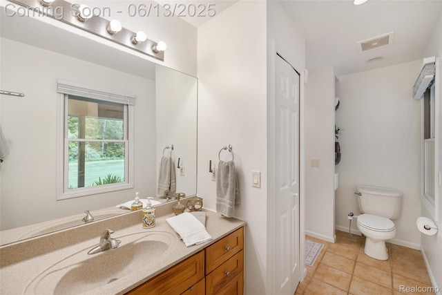 4230 Mill Lake Rd, Lake Orion, MI 48360 - bathroom with vanity, tile patterned floors, and a closet