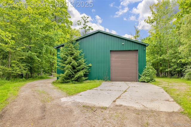 4230 Mill Lake Rd, Lake Orion, MI 48360 - detached garage featuring driveway