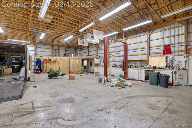 4230 Mill Lake Rd, Lake Orion, MI 48360 - garage with a workshop area