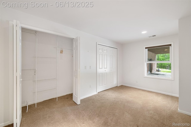 4230 Mill Lake Rd, Lake Orion, MI 48360 - unfurnished bedroom with multiple closets, carpet, and recessed lighting
