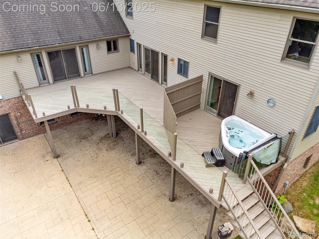 4230 Mill Lake Rd, Lake Orion, MI 48360 - back of property featuring a hot tub, stairway, a deck, roof with shingles, and a patio