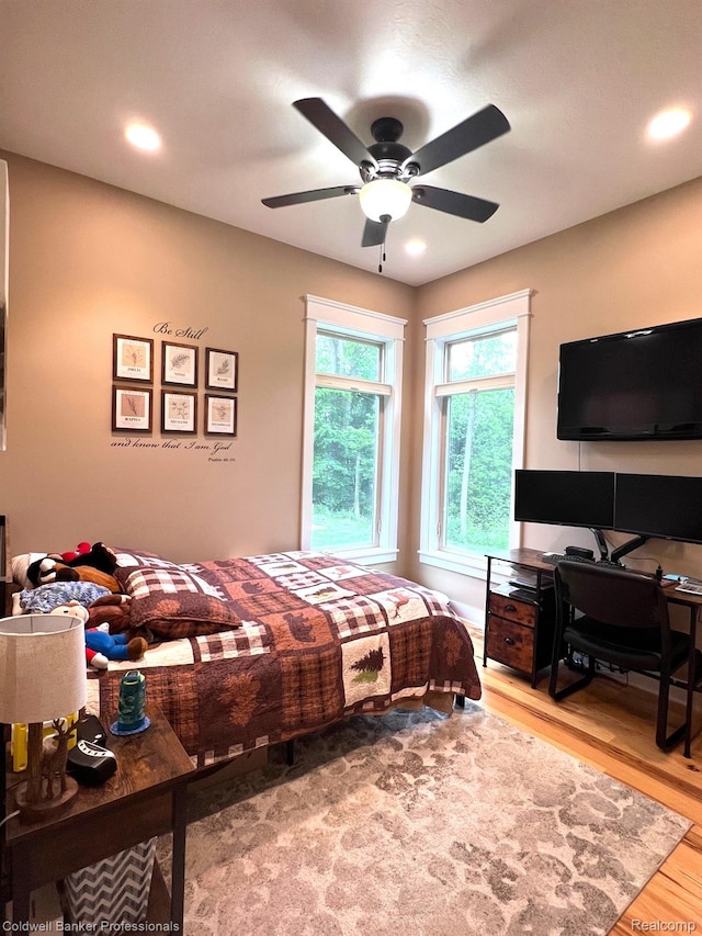 4264 W Benjamin Rd, Perry, MI 48872 - bedroom featuring wood finished floors, a ceiling fan, and recessed lighting