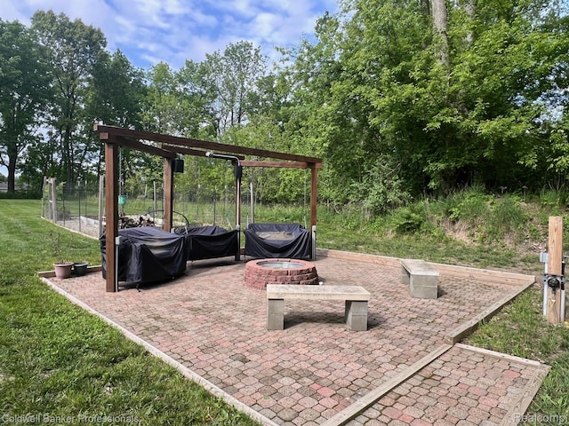 4264 W Benjamin Rd, Perry, MI 48872 - view of patio featuring a fire pit
