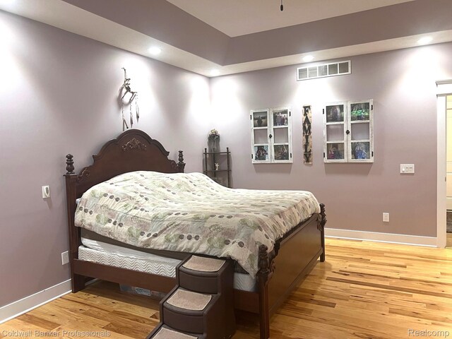 4264 W Benjamin Rd, Perry, MI 48872 - bedroom featuring wood finished floors, baseboards, and recessed lighting