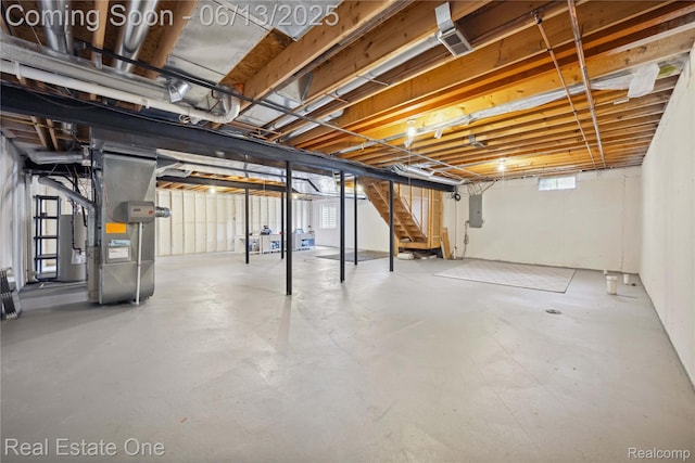 3788 High Grove Way, Lake Orion, MI 48360 - below grade area with stairs, heating unit, and electric panel