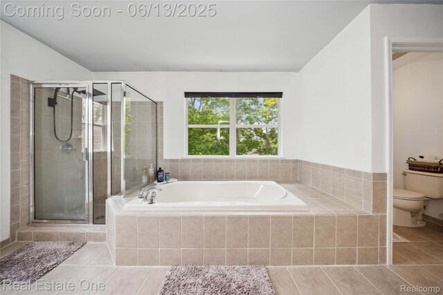 3788 High Grove Way, Lake Orion, MI 48360 - full bath with toilet, a garden tub, a shower stall, and tile patterned flooring