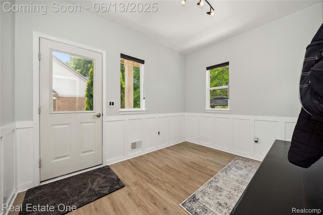 3788 High Grove Way, Lake Orion, MI 48360 - foyer with a wainscoted wall, wood finished floors, and a decorative wall