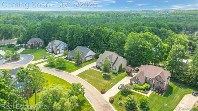 3788 High Grove Way, Lake Orion, MI 48360 - aerial perspective of suburban area featuring a heavily wooded area