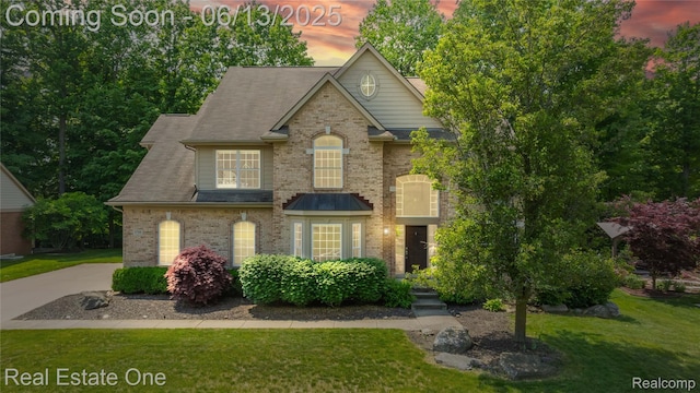 3788 High Grove Way, Lake Orion, MI 48360 - view of front of house featuring brick siding and a front yard