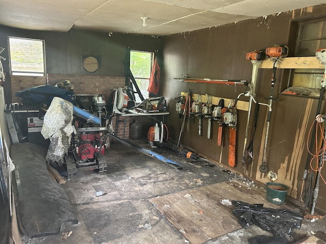 342 Grand St, Michigan Center, MI 49254 - miscellaneous room featuring plenty of natural light and wood walls