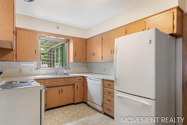 1001 Cricklewood St SW, Wyoming, MI 49509 - kitchen featuring white appliances, a sink, and light countertops