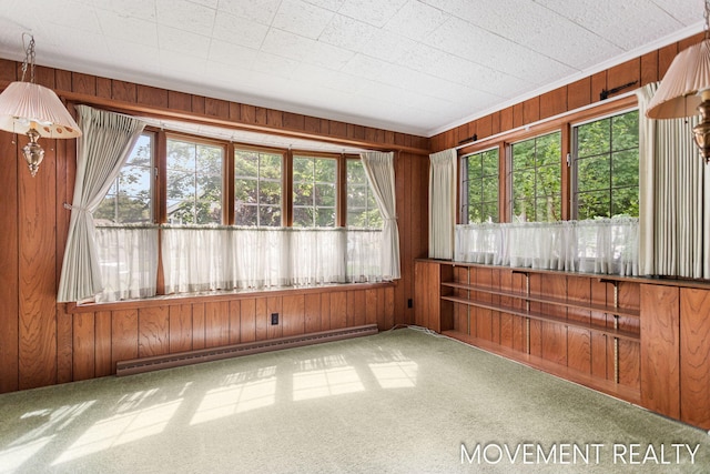 1001 Cricklewood St SW, Wyoming, MI 49509 - unfurnished sunroom featuring a baseboard heating unit and plenty of natural light