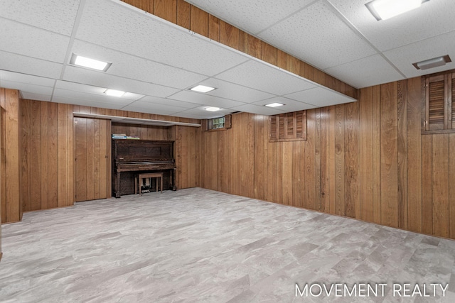 1001 Cricklewood St SW, Wyoming, MI 49509 - finished below grade area featuring a paneled ceiling and wood walls