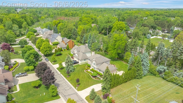 2105 Rob Rdg, Commerce Twp, MI 48390 - aerial perspective of suburban area with a forest