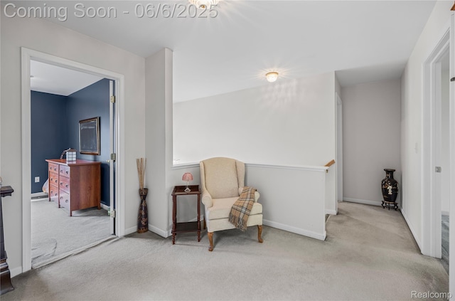 2105 Rob Rdg, Commerce Twp, MI 48390 - sitting room with carpet floors, baseboards, and an upstairs landing