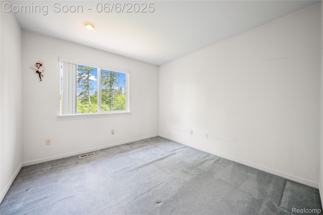2105 Rob Rdg, Commerce Twp, MI 48390 - carpeted empty room featuring baseboards