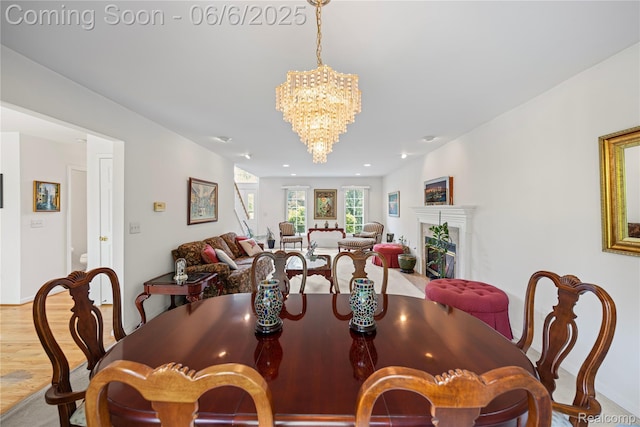 2105 Rob Rdg, Commerce Twp, MI 48390 - dining area with a chandelier, wood finished floors, and recessed lighting