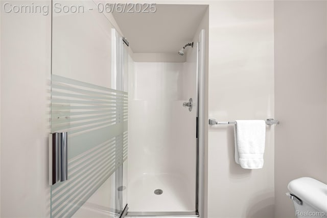 2105 Rob Rdg, Commerce Twp, MI 48390 - full bathroom with a stall shower and toilet