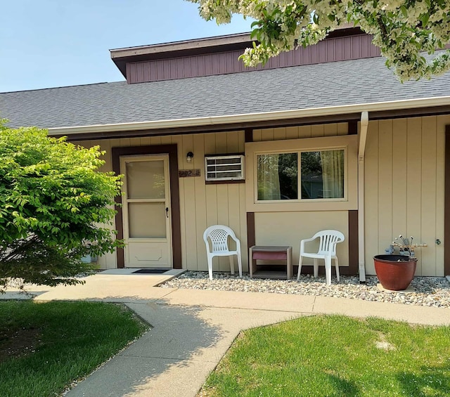 202 E Water Ave, Oscoda, MI 48750 - entrance to property with roof with shingles