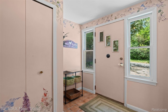 4044 Fieldview Ave, West Bloomfield, MI 48324 - entryway featuring plenty of natural light, light tile patterned flooring, and baseboards